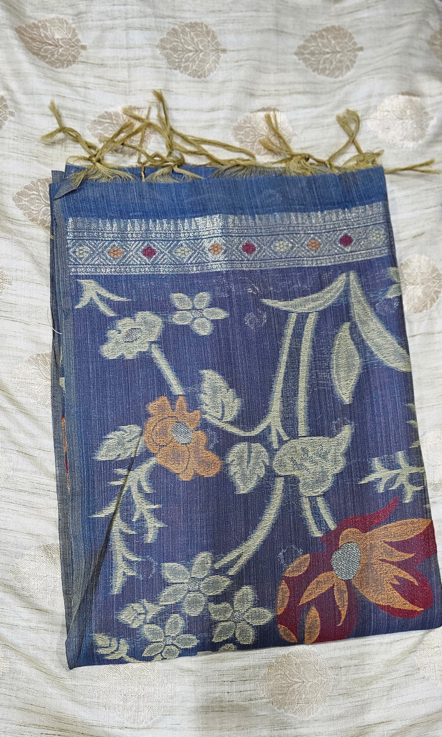 Organic tussar silk saree in rich blue base color with intricate floral embroider
