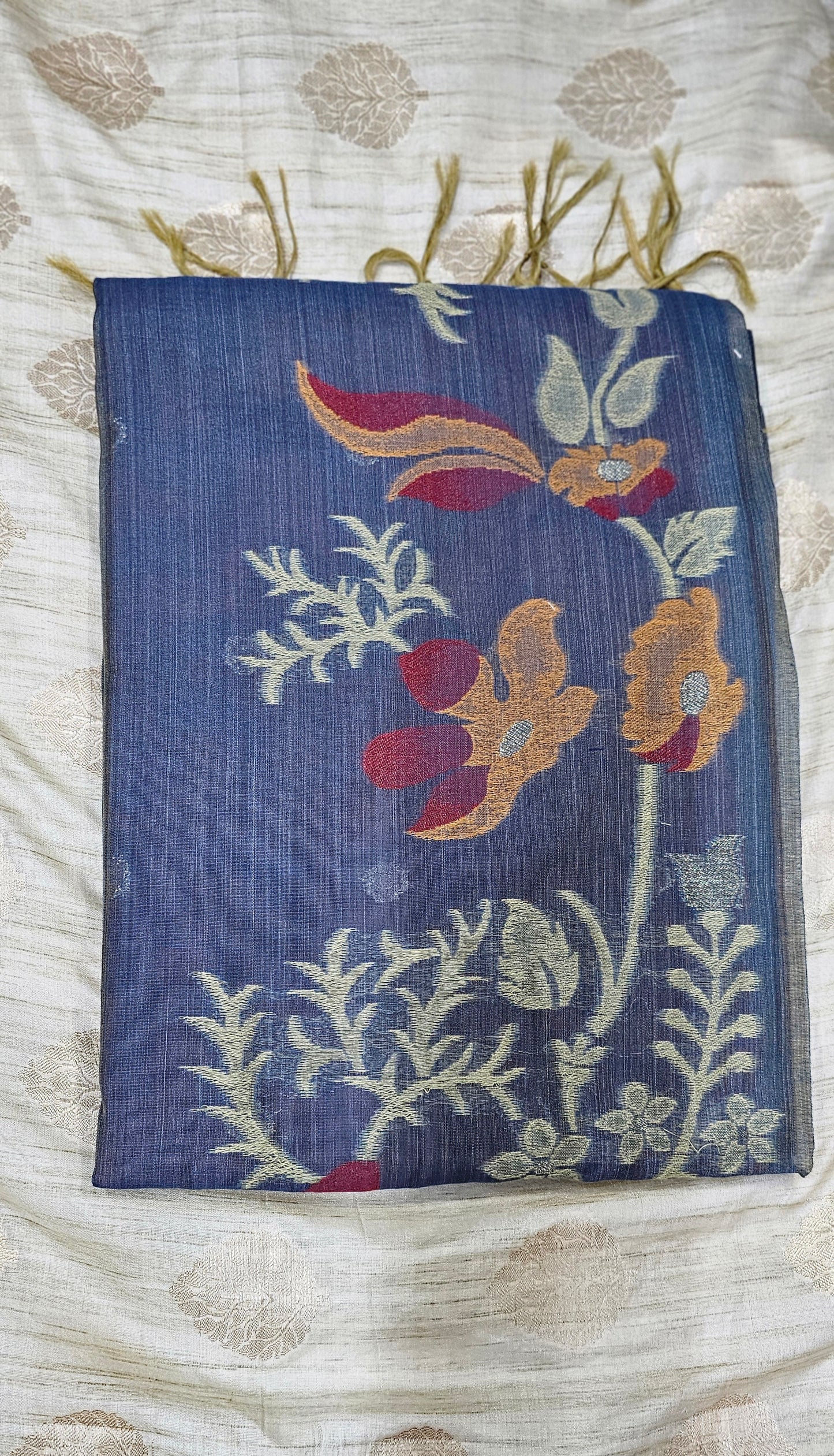 Organic tussar silk saree in rich blue base color with intricate floral embroider