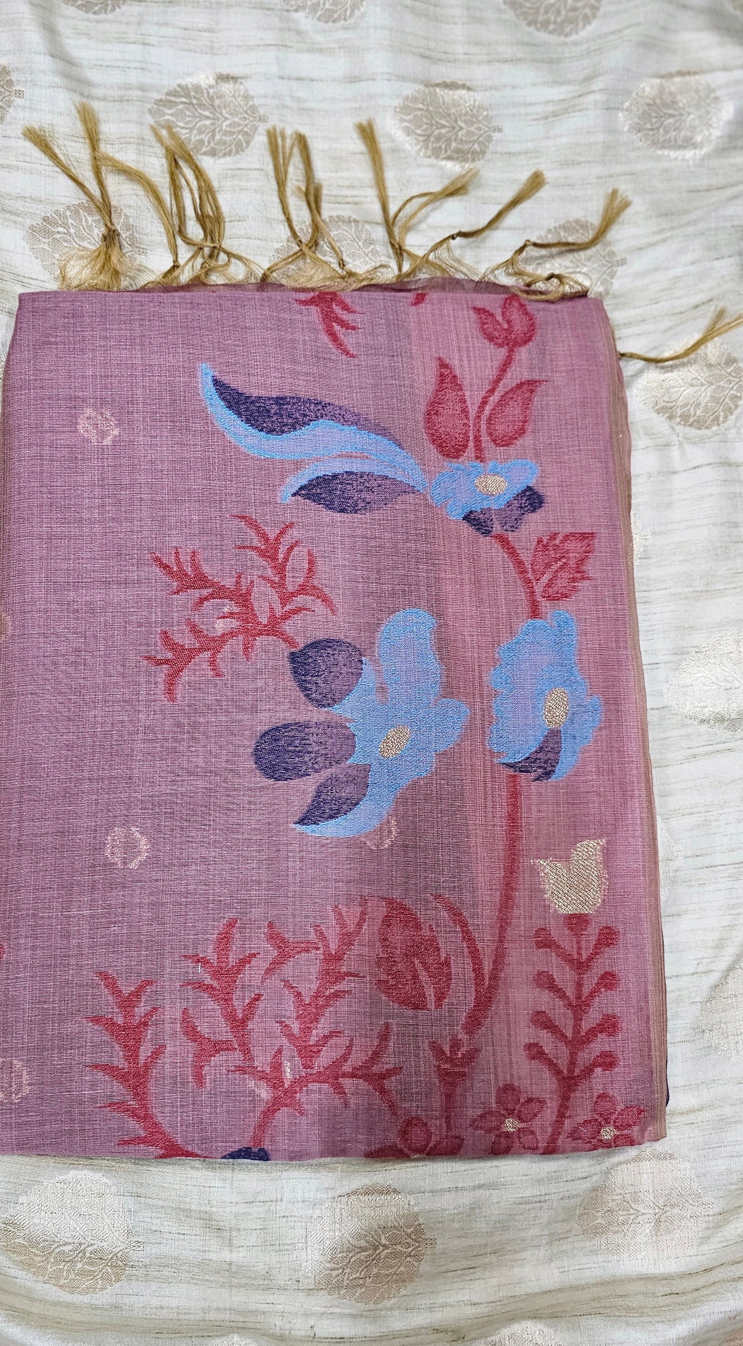 Organic tussar silk saree in muted pink color with intricate floral embroidery