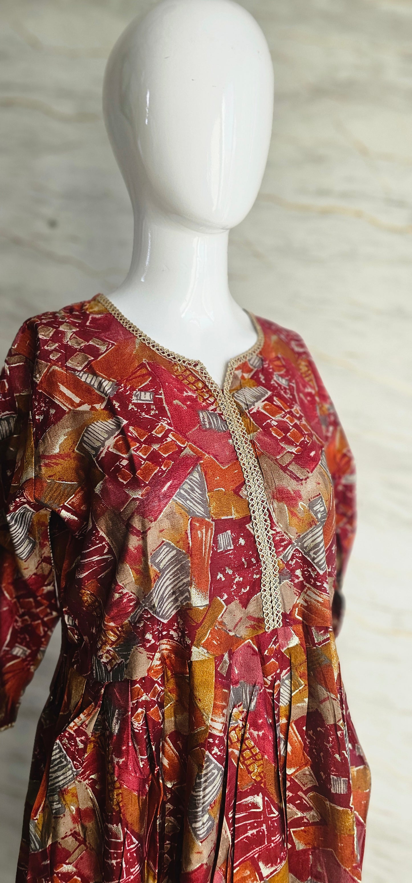 Muslin fabric kurti with zari work on neckline and sleeves