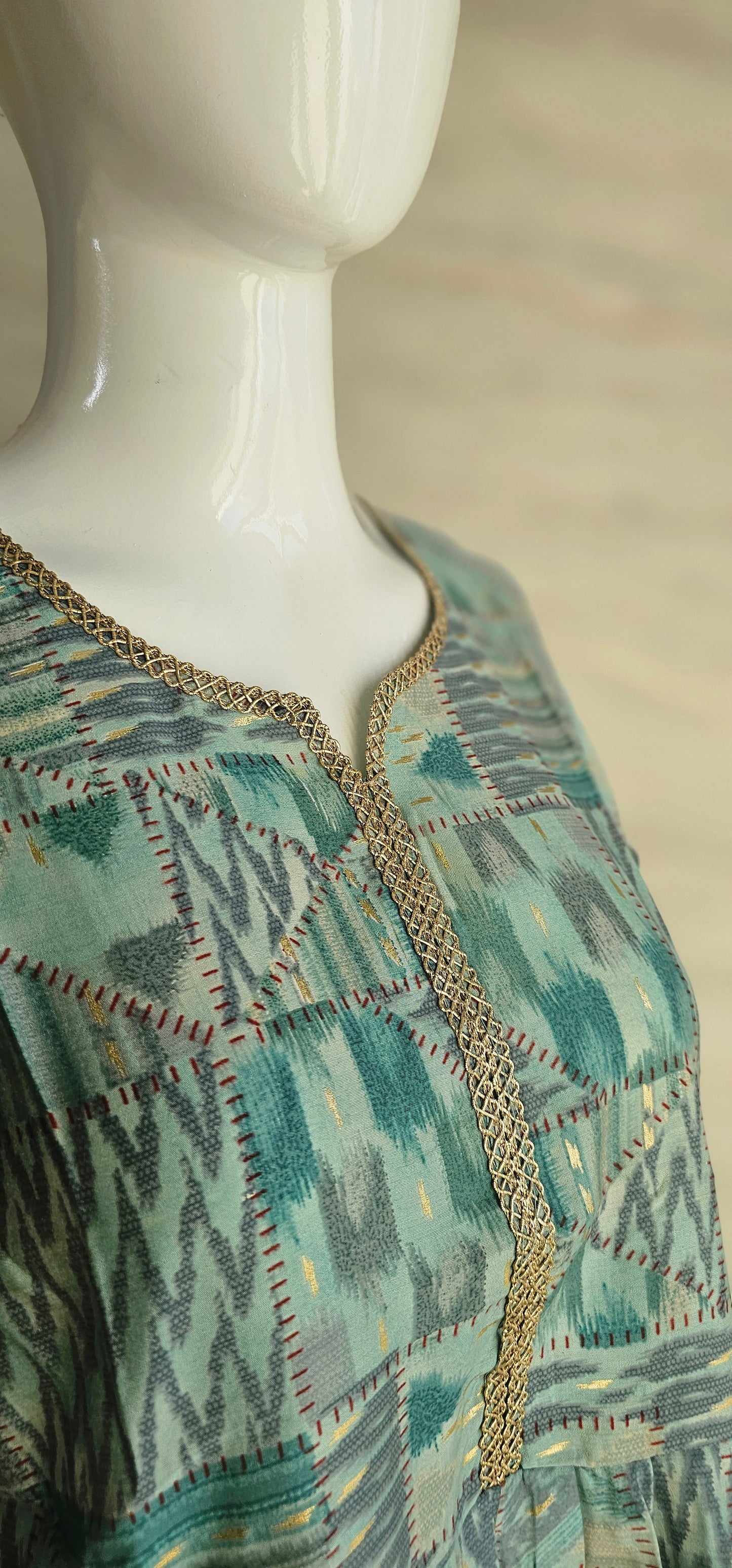 Muslin fabric kurti with zari work on neckline and sleeves