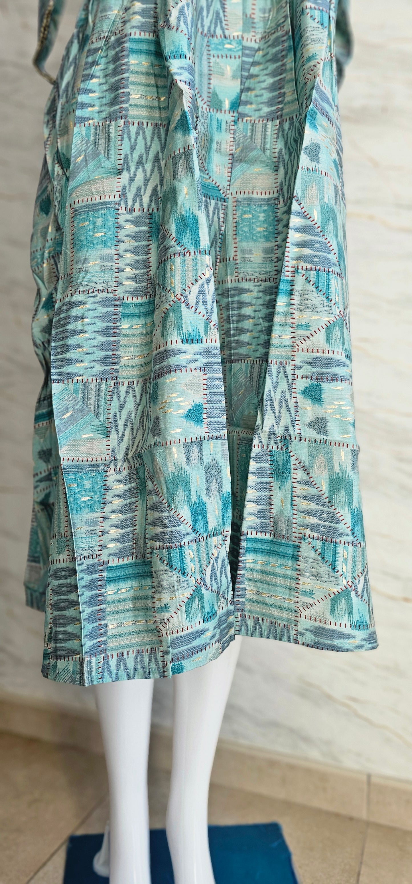 Muslin fabric kurti with zari work on neckline and sleeves
