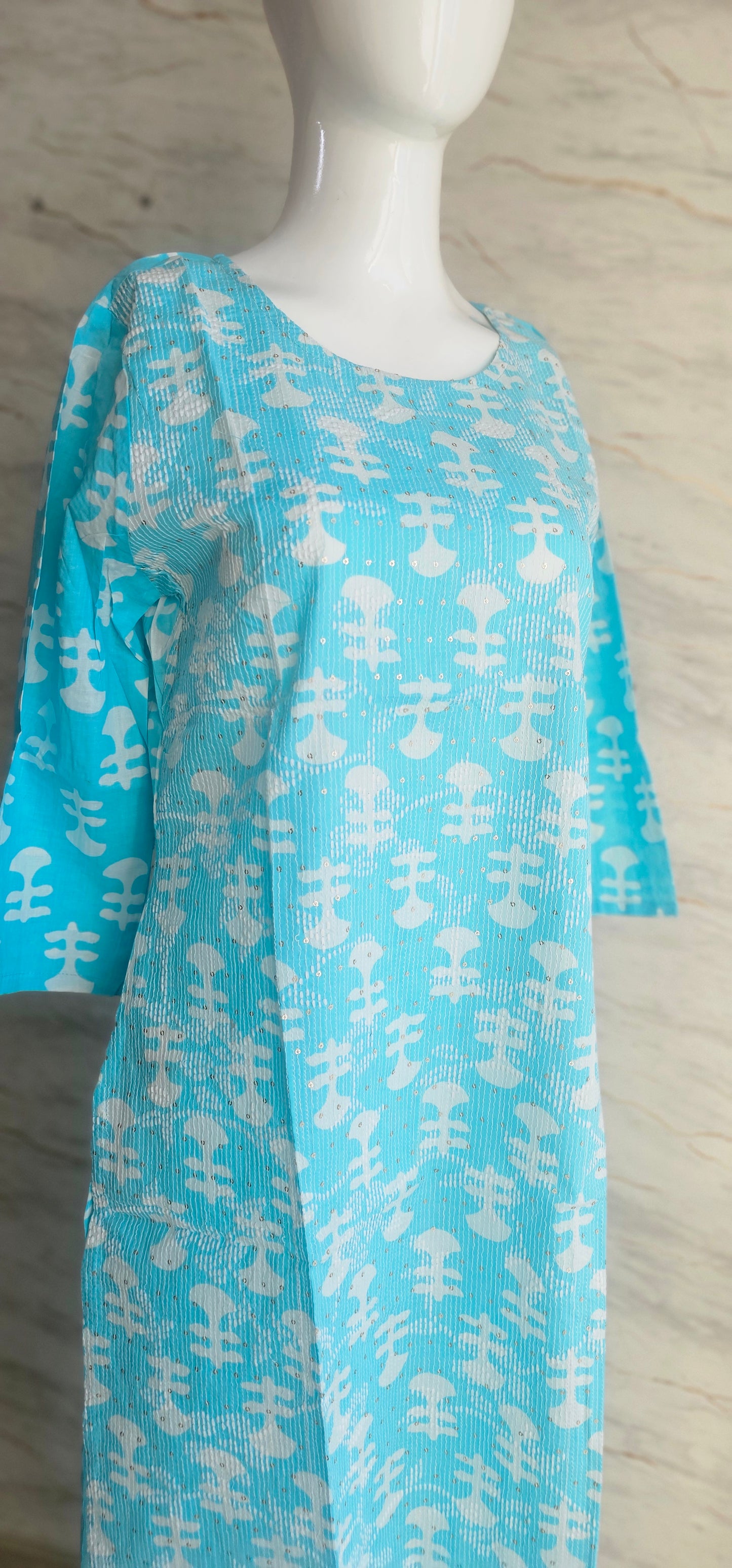 Elegant Cotton fabric kurti with printed motifs and thread work allover