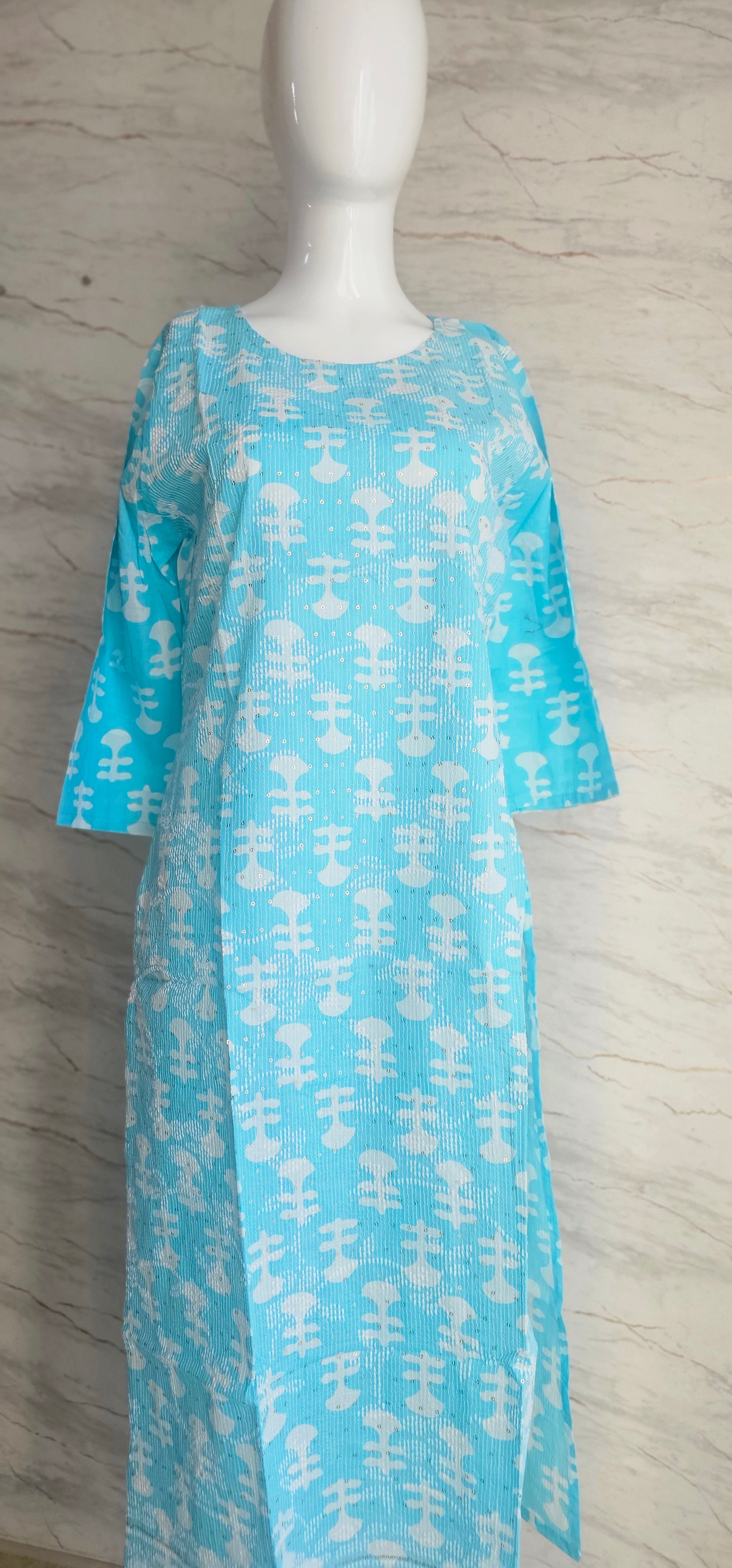 Elegant Cotton fabric kurti with printed motifs and thread work allover