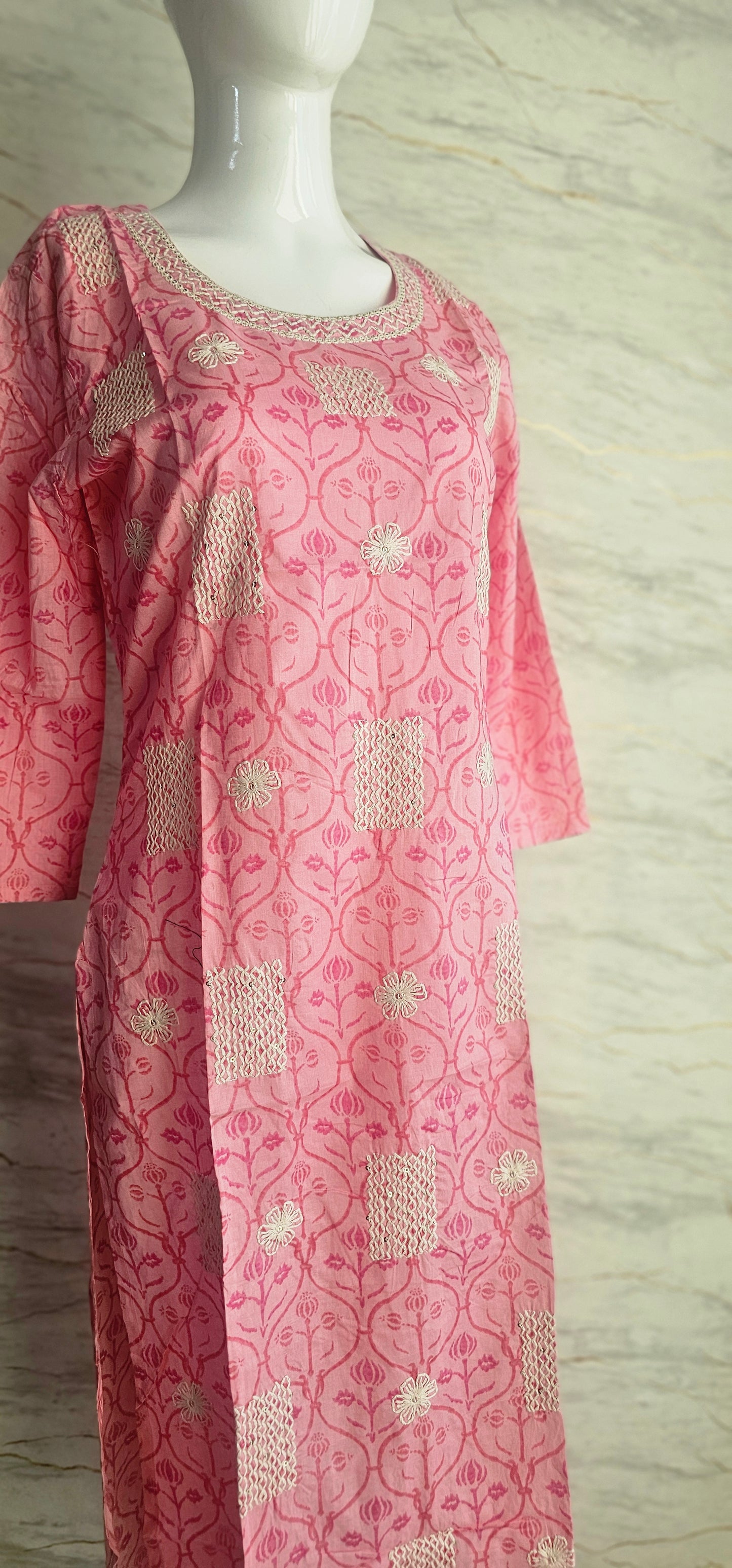 Elegant Cotton fabric kurti with printed motifs and thread work allover