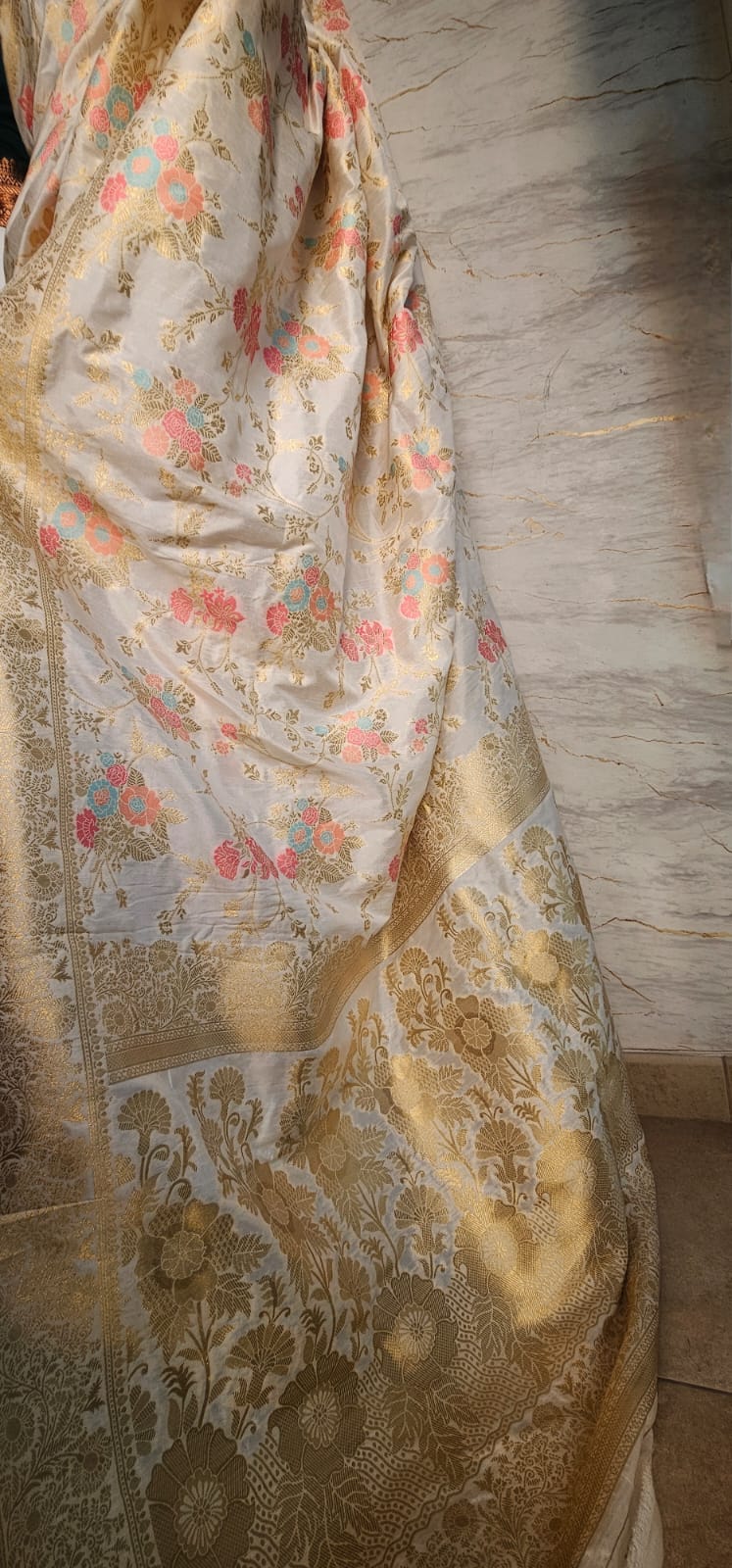 Pure cotton dyeable fabric with multicolor thread work all over.