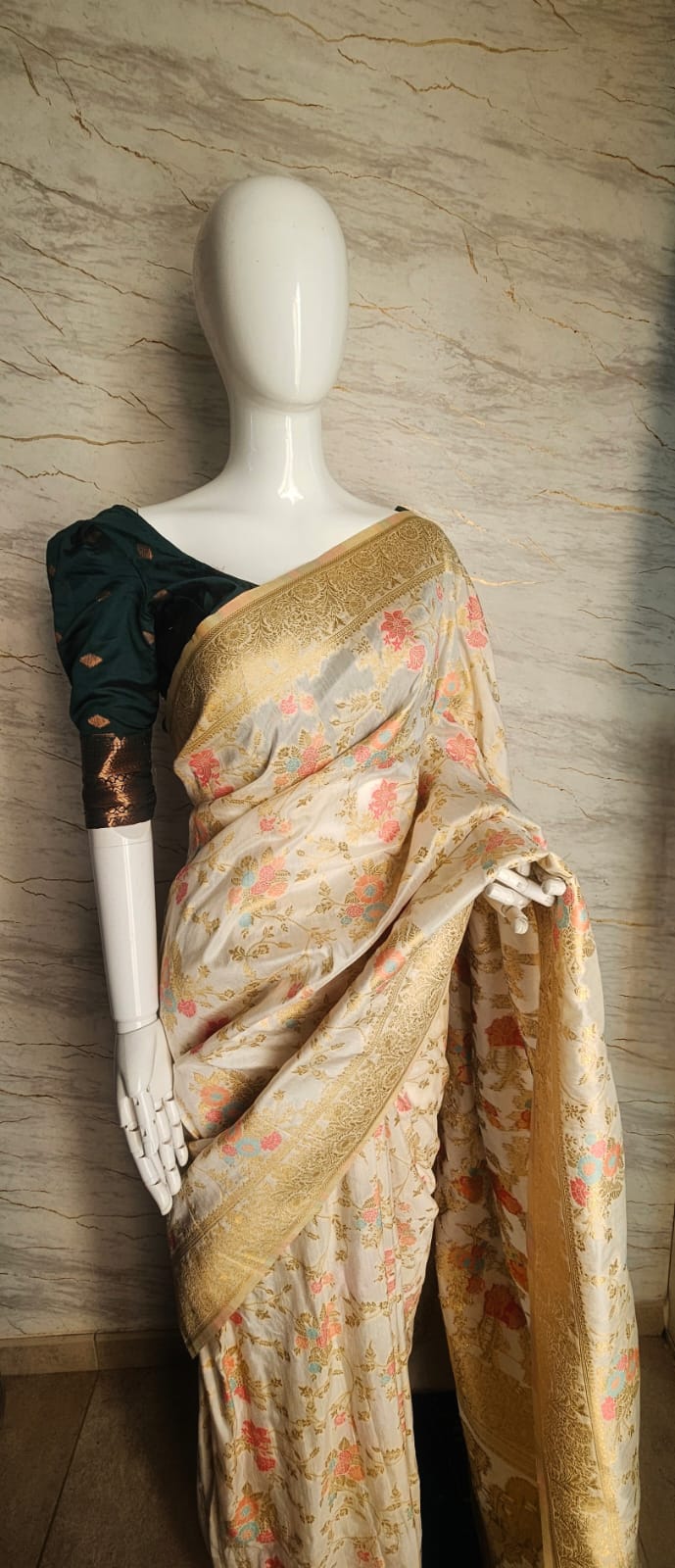 Pure cotton dyeable fabric with multicolor thread work all over.