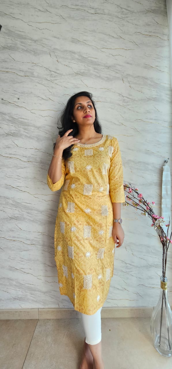 Cotton kurti in mustard gold shade foliage pattern allover.