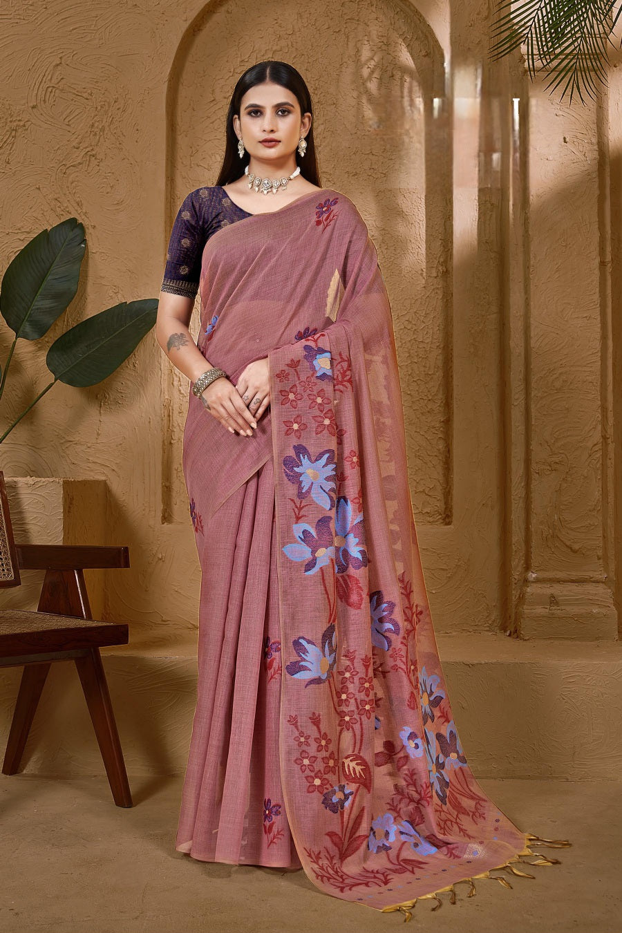 Organic tussar silk saree in muted pink color with intricate floral embroidery