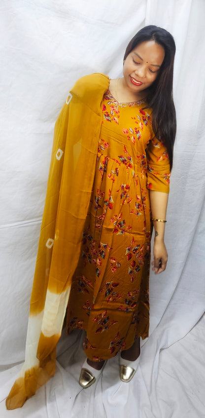 3 pc salwaar suit set in cotton rayon fabric in mustard yellow color.