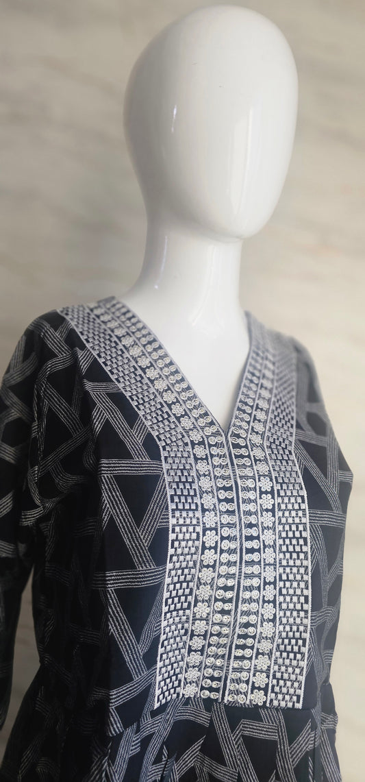 Muslin fabric kurti with emroidered neckline.