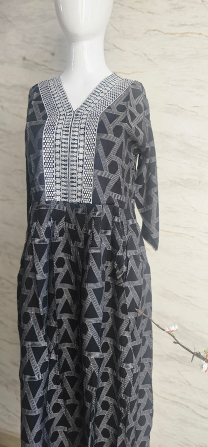 Muslin fabric kurti with emroidered neckline.
